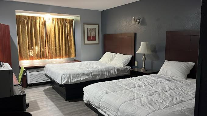 Blisspoint Inn & Suites, Northwood Bagian luar foto